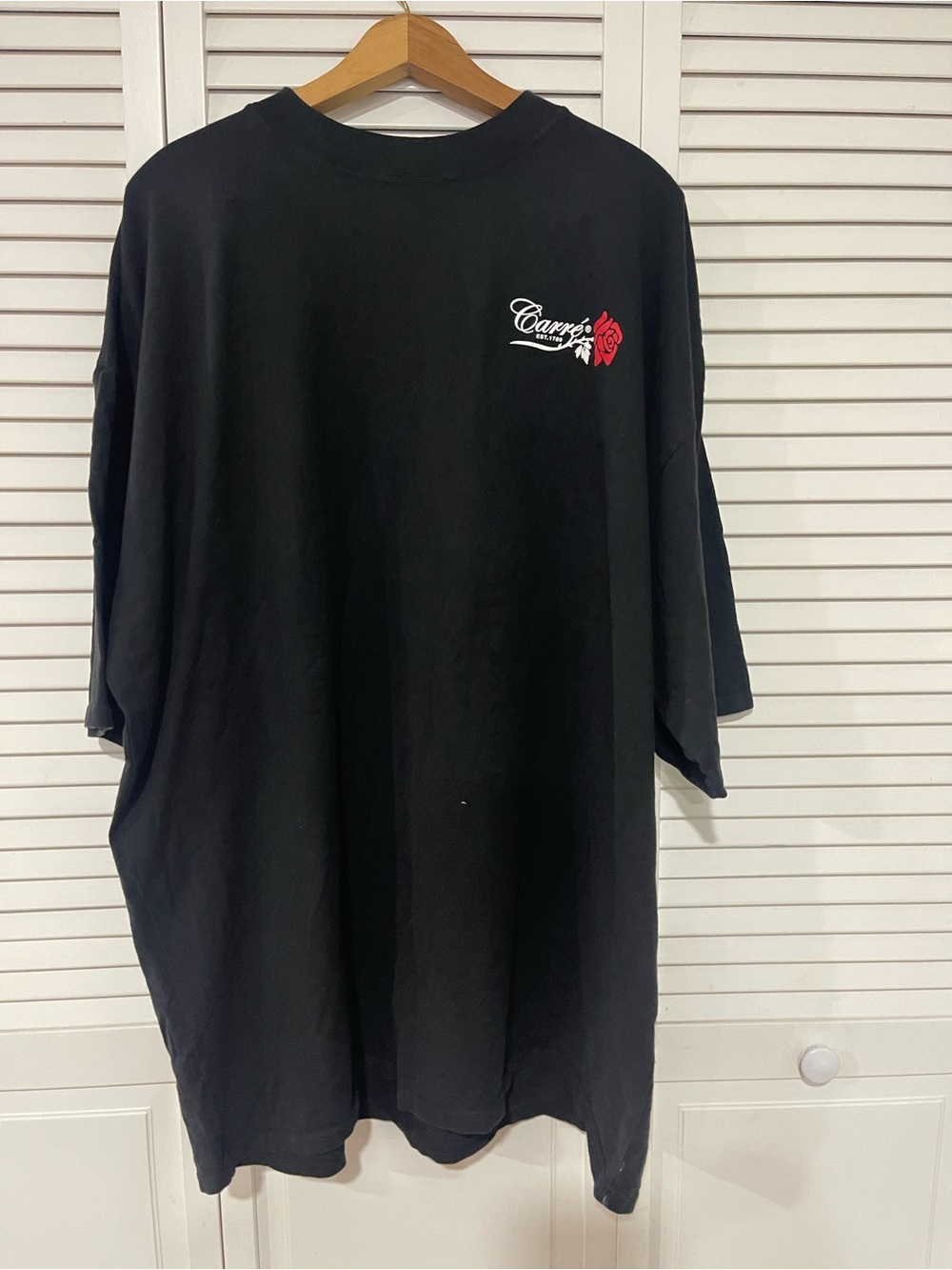 Black Short-Sleeve Men's Tee with Small Rose Graphic